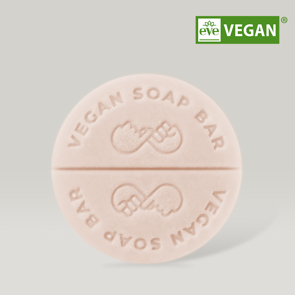DONGGUBAT Vegan Treatment Bar Dongbaek with embossed vegan logo, eco-friendly packaging, and certified vegan label.