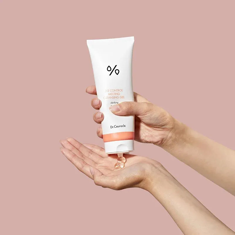 Person applying DR.CEURACLE 5 Alpha Control Melting Cleansing Gel 150ml onto hand.