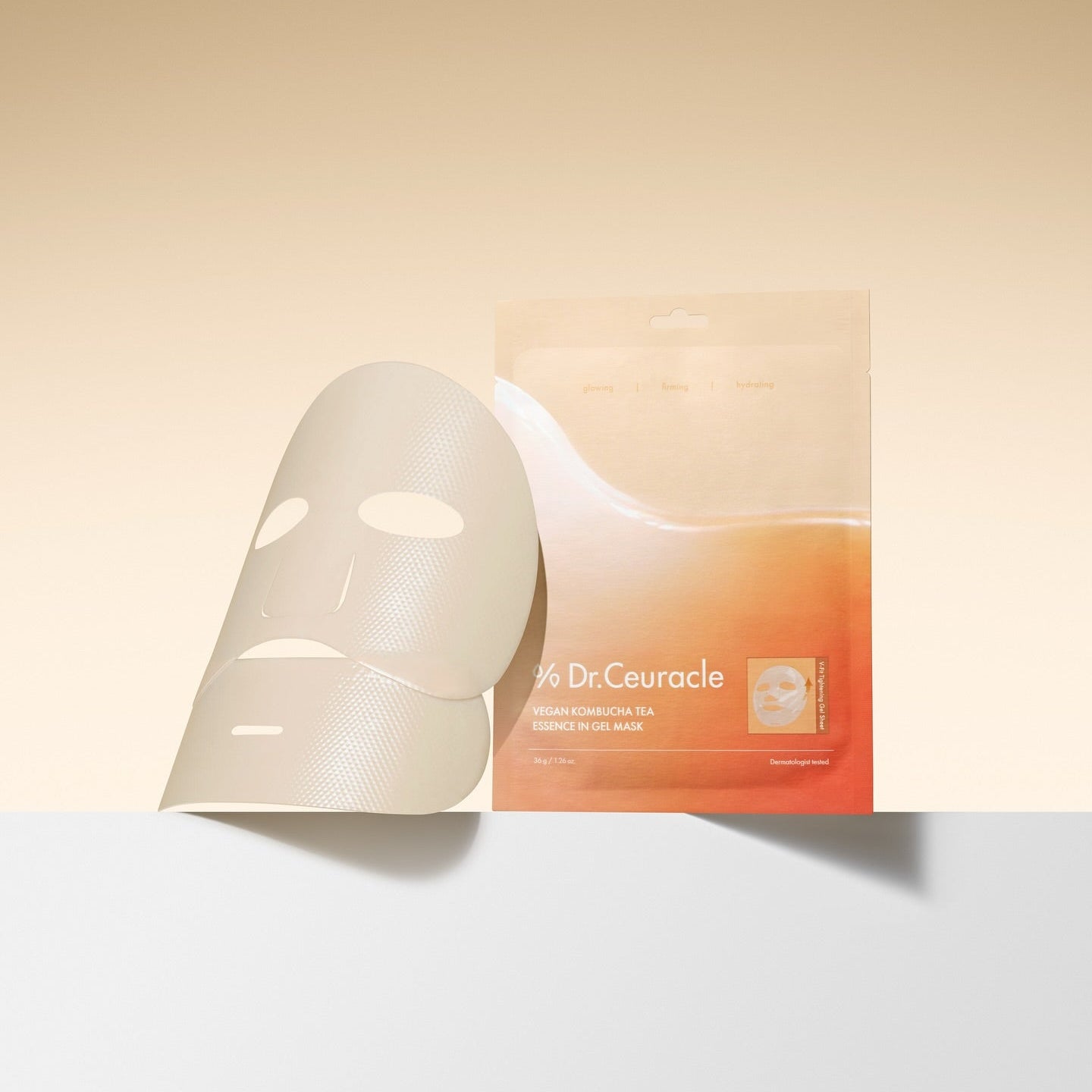 DR.CEURACLE Vegan Kombucha Tea Essence-in-Gel Mask featured next to its packaging against a minimalist background.