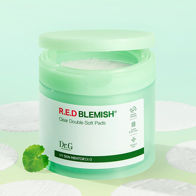 Image of DR.G Red Blemish Clear Double Soft Pads 60 Sheets in a green container with visible pads, ideal for skincare routines.