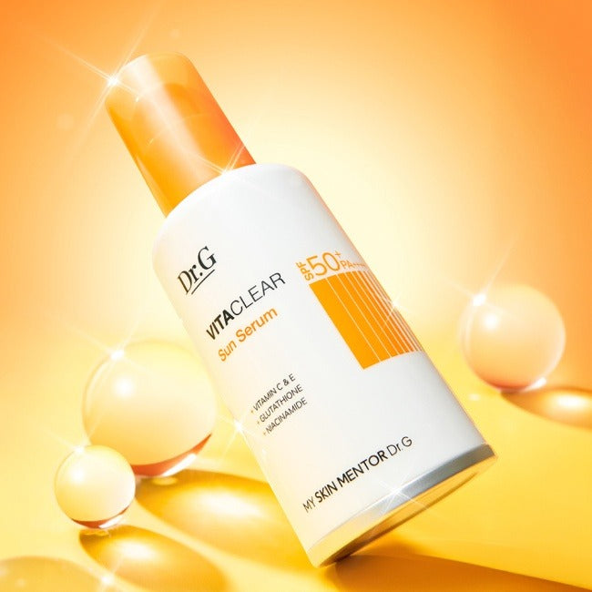 DR.G Vita Clear Sun Serum 50ml in vibrant orange packaging with sunburst background