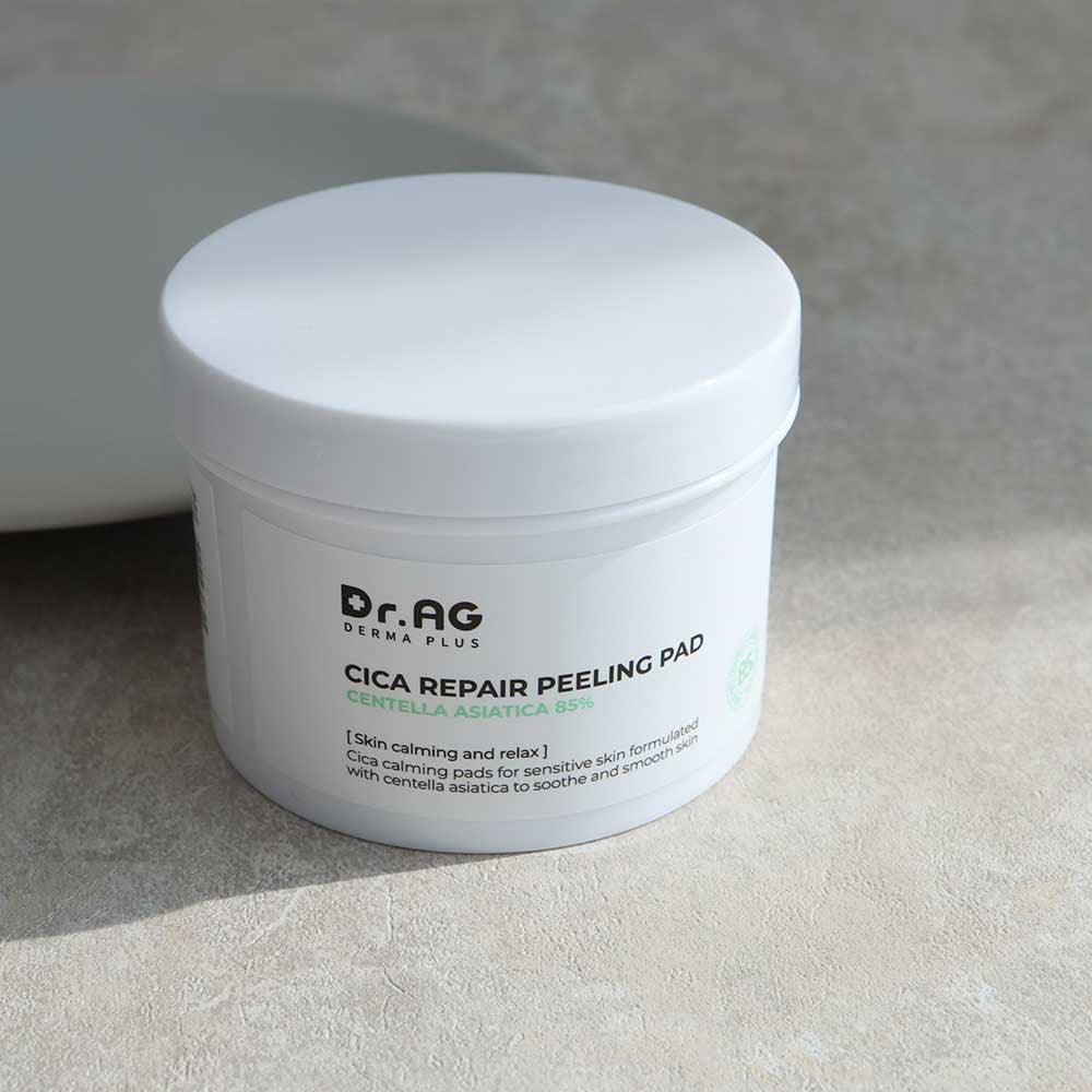 Dr.AG Cica Repair Peeling Pad container with product details and branding, designed for skin calming and repair with Centella Asiatica.
