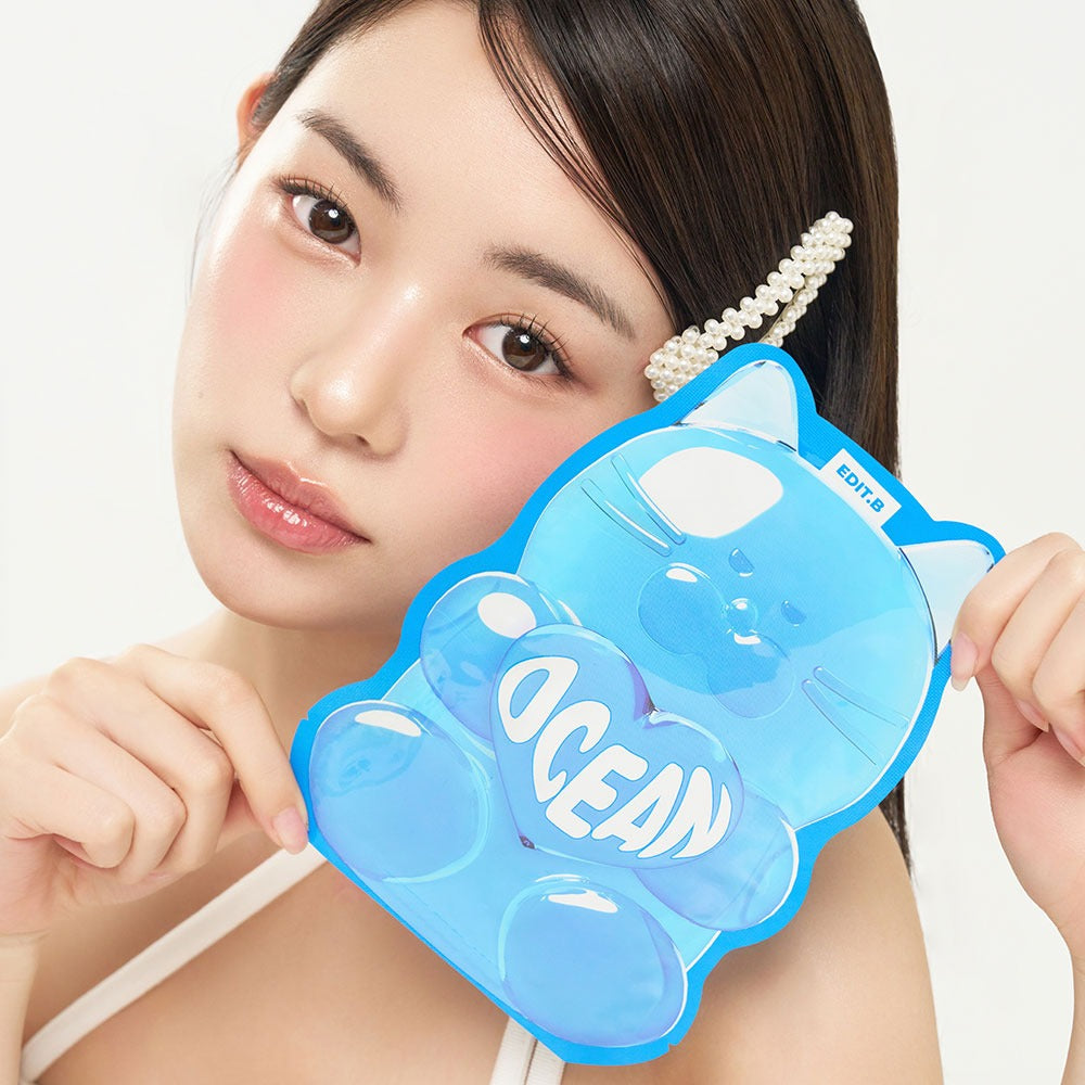 Person holding EDIT.B Waterfull Gumi Mask Ocean packaging.