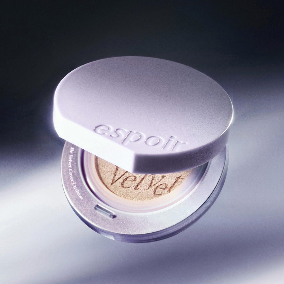 ESPOIR Bevelvet Cover Cushion SPF42 PA++ [Galaxy Beam Collection] compact with sleek design in soft lighting.