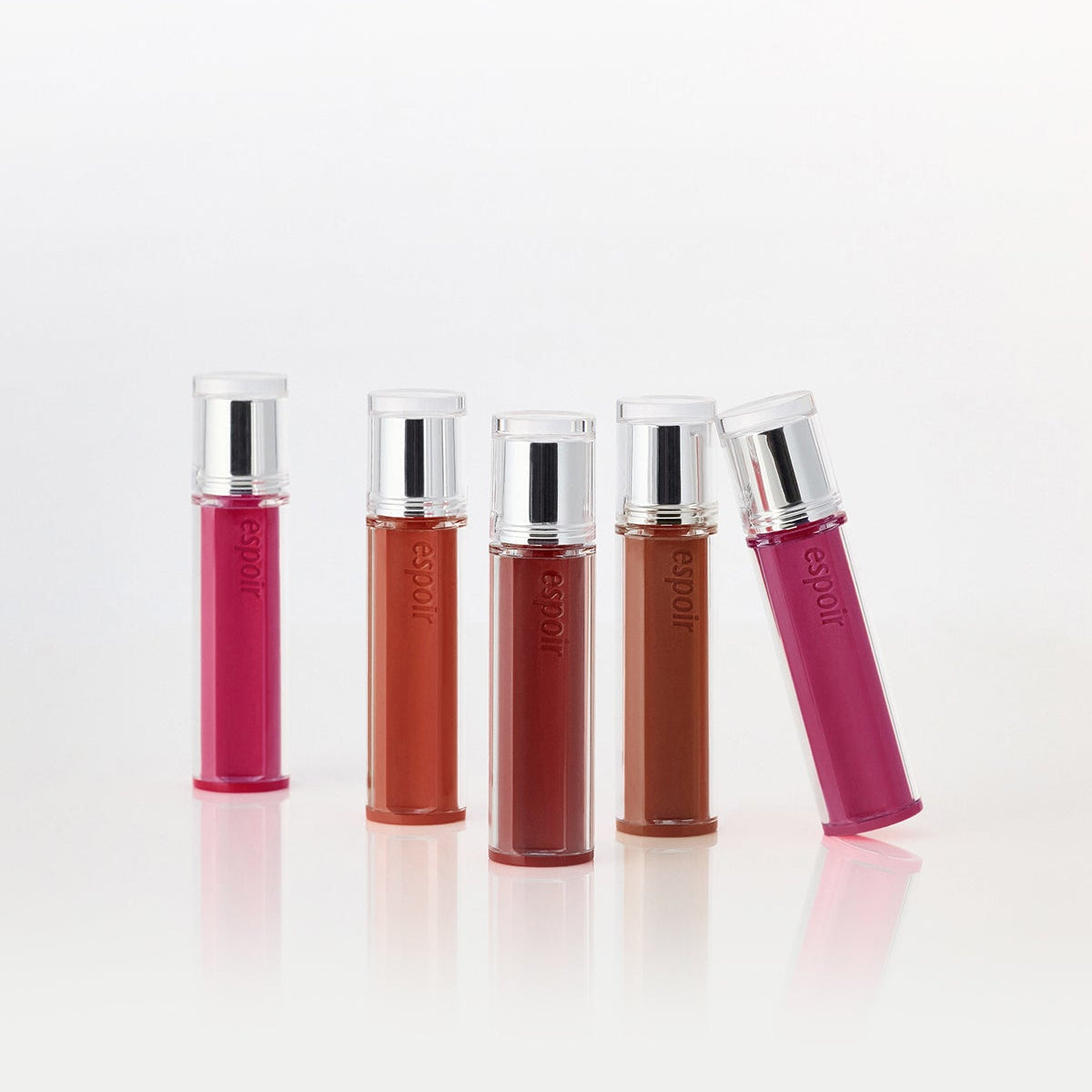 ESPOIR Couture Lip Tint Glaze collection in vibrant shades on display.