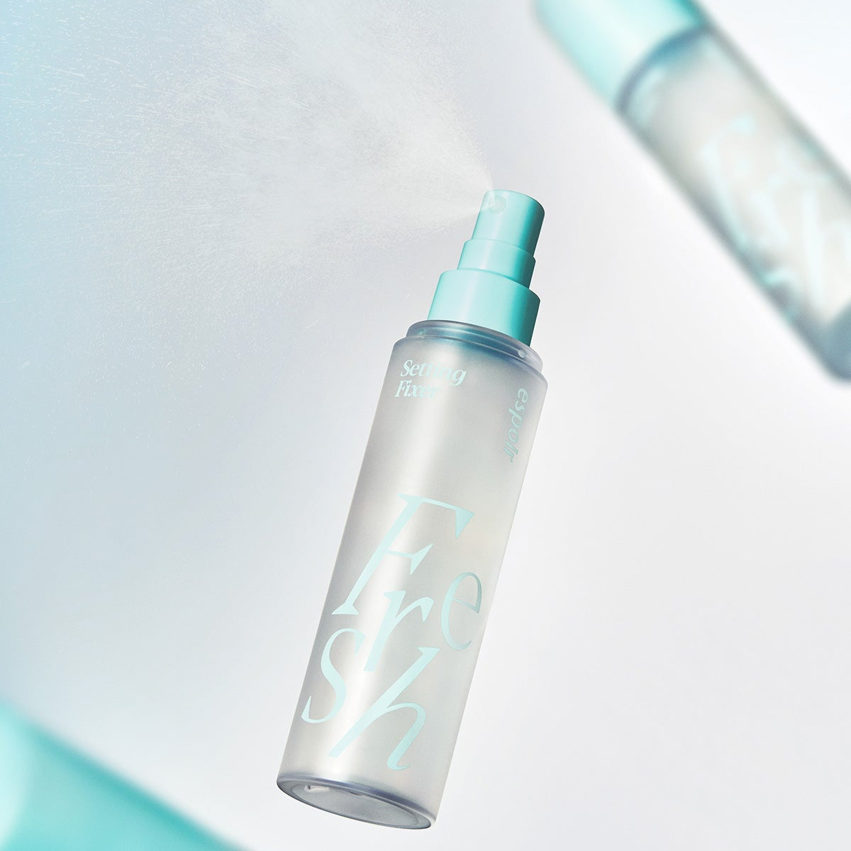 ESPOIR Fresh Setting Fixer 100ml in elegant packaging, showcasing fine mist for a long-lasting makeup finish.