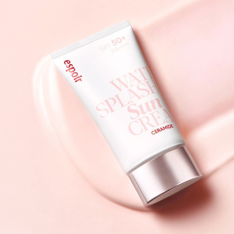 ESPOIR Water Splah Sun Cream Ceramide SPF50 + PA++++ 60ml tube on a soft pink background