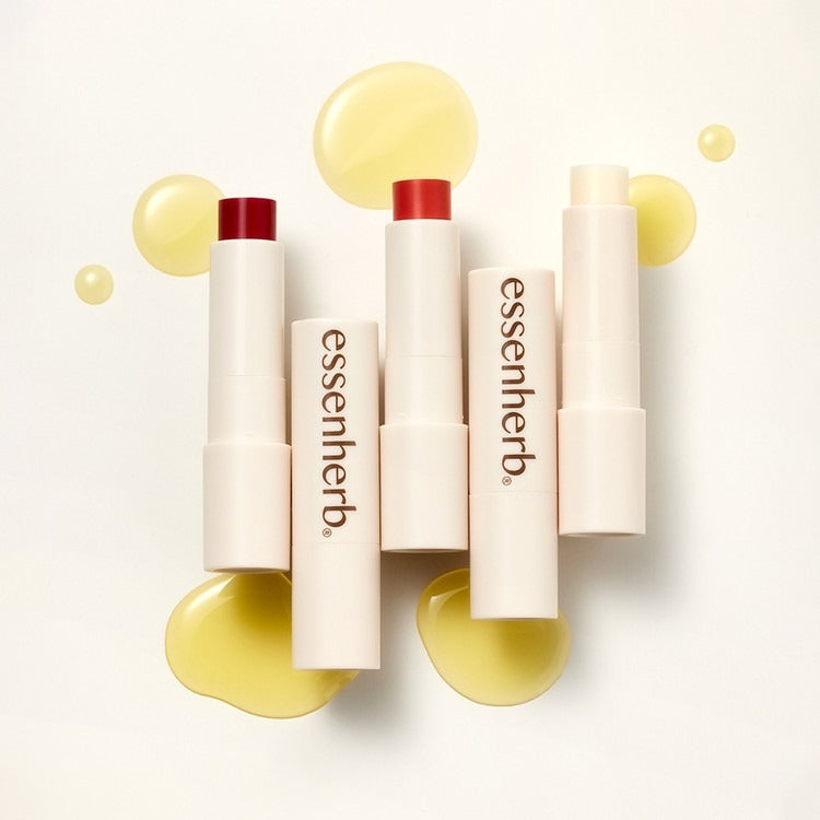 ESSENHERB Jojoba Essentail Lip Balm 4g with glossy texture showcased on white background