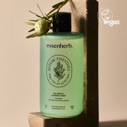 ESSENHERB Tea Tree 90 Calming Toner 320ml vegan skincare product bottle with plant decor