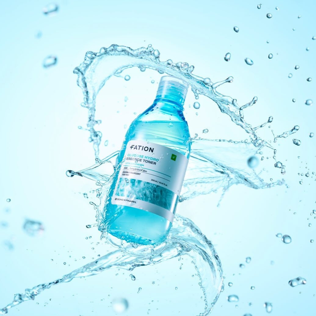 FATION Glucose Hydro Essence Toner 500ml bottle with water splash effect, perfect for hydration and skincare routine.