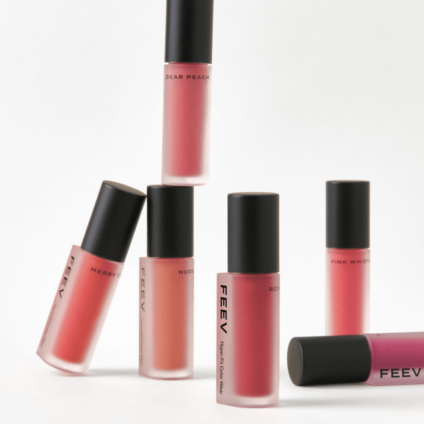 FEEV Hyper-Fit Color Wear Tint collection showcasing various shades of lip tint in sleek packaging.