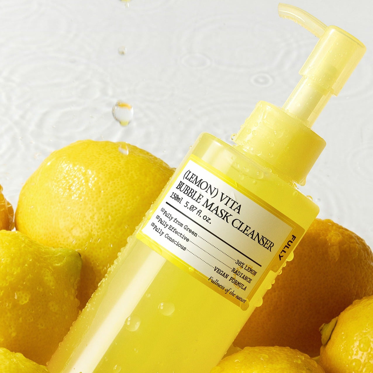 FULLY Lemon Vita Bubble Pack Cleanser 150ml bottle with lemons in the background, showcasing vibrant and refreshing skincare packaging.