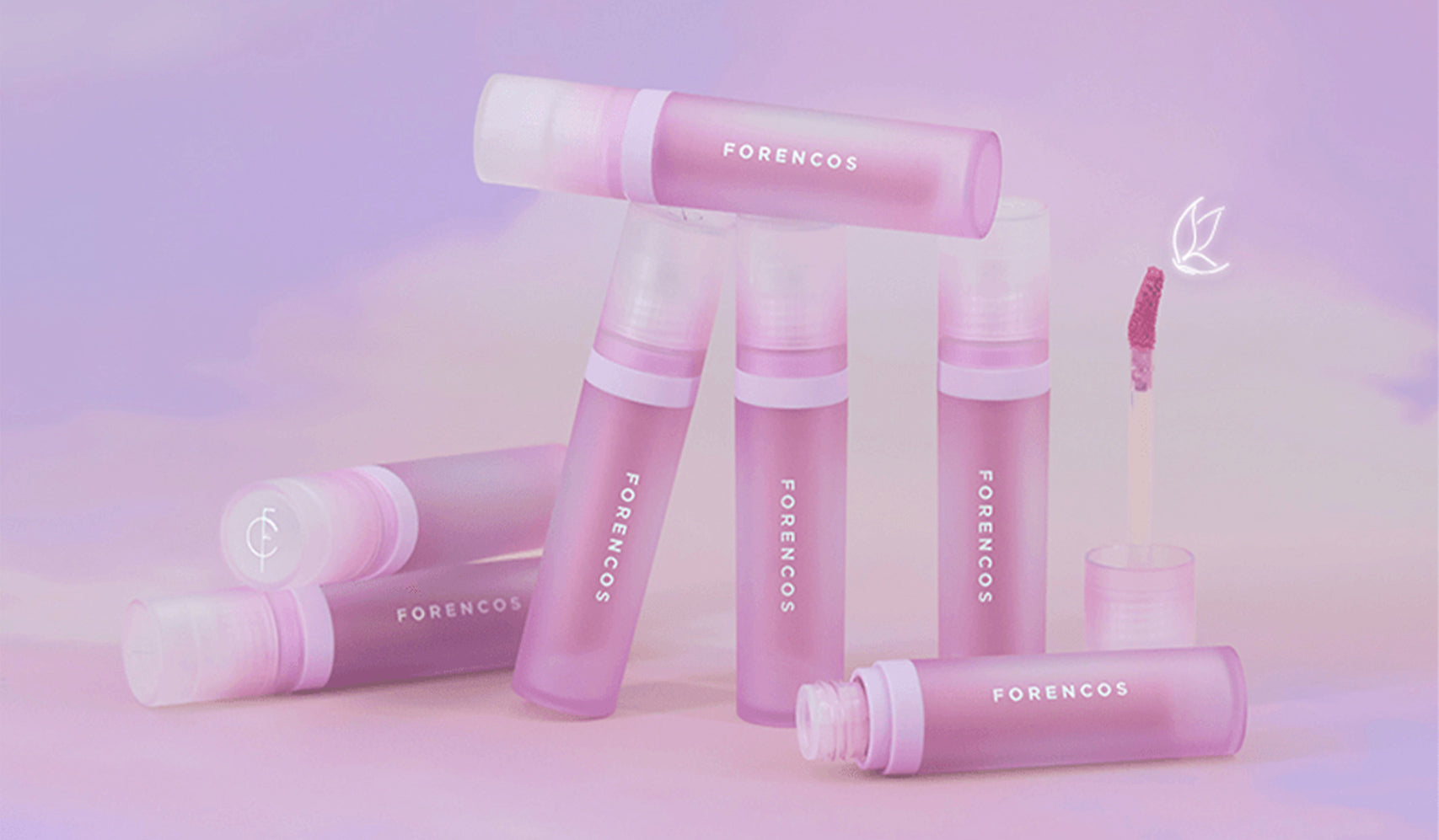 Forencos pink gradient cosmetic bottles and lip gloss with floral design on a pastel background.