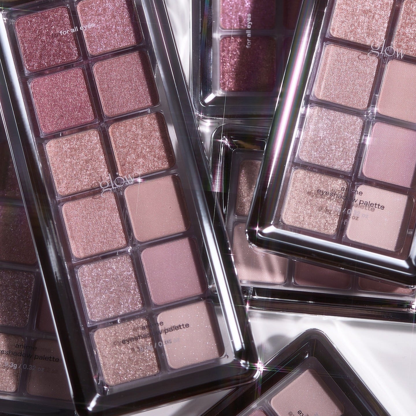 GLOW Anime Eyeshadow Palette featuring a variety of shimmering shades in multiple palettes, perfect for anime-inspired makeup looks.
