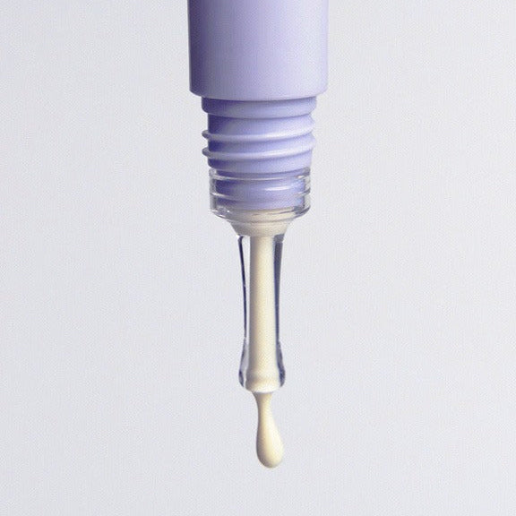 GLOW Apple Retinol Eye Cream 15ml with creamy texture in applicator tube
