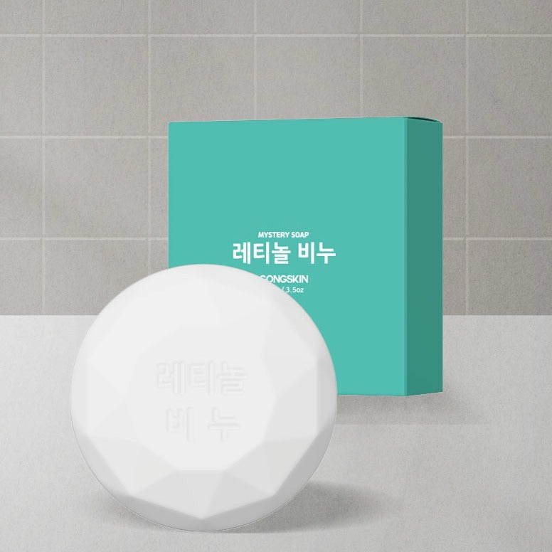 GONGSKIN Retinol Soap 100g in front of packaging on tiled background.