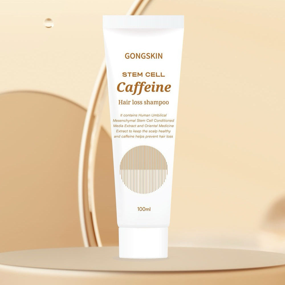 GONGSKIN Stem Cell Caffeine Summer Hair Loss Shampoo 100ml bottle on a beige background promotes hair health and prevents hair loss.