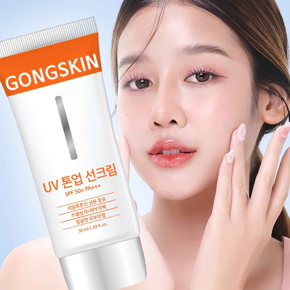 GONGSKIN UV Tone-up Sunscreen 50ml product shown with model applying the sunscreen to her face for skin protection and tone-up effect.