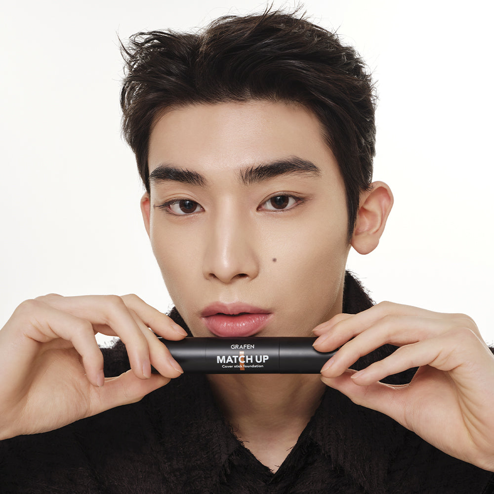 GRAFEN Match Up Cover Stick Foundation 12g held by male model - Gentleman Korea product image for Korean men’s skincare