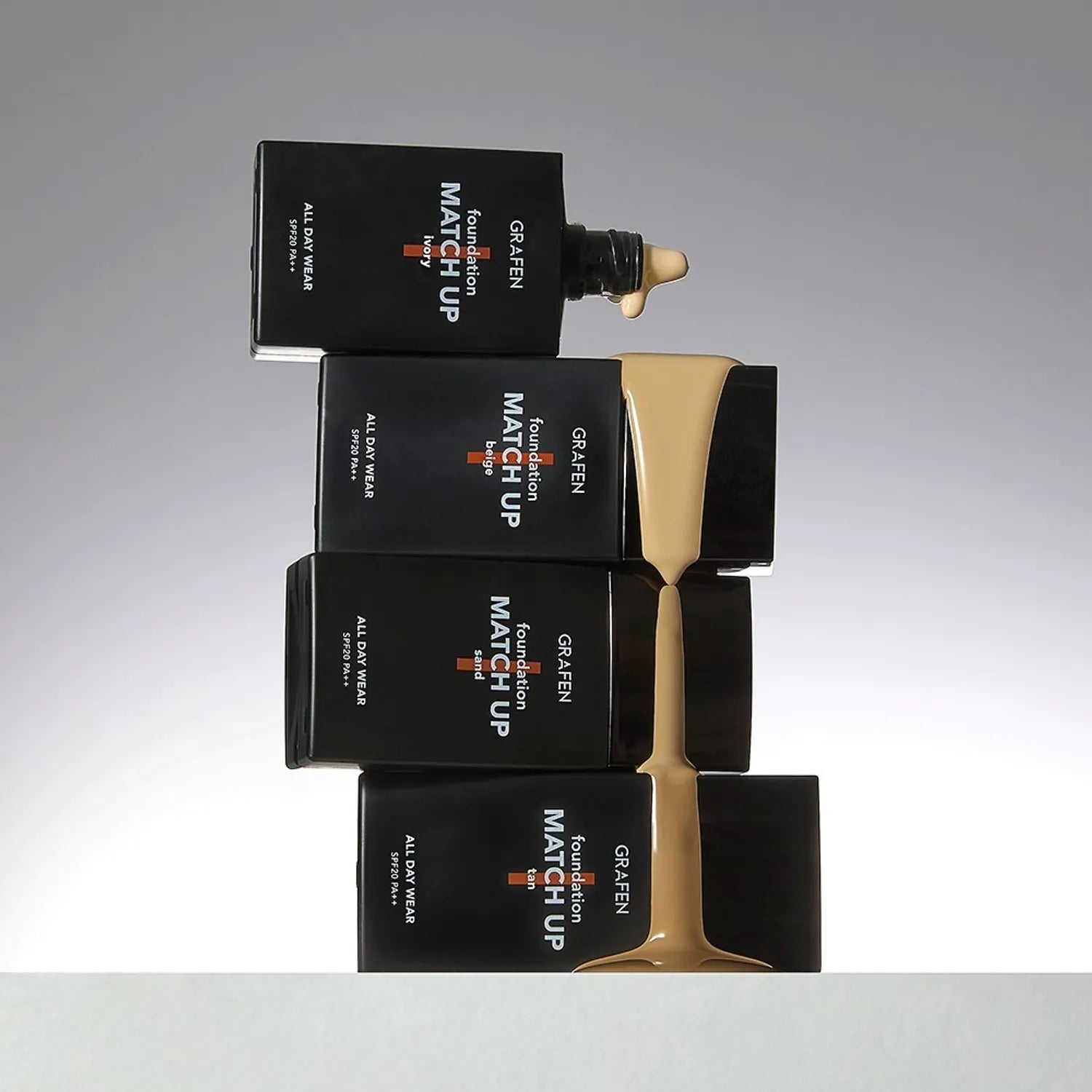 GRAFEN Match Up Foundation 40ml product shot by Gentleman Korea — black bottles stacked with foundation spilling to show shade and texture