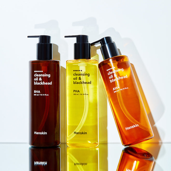 HANSKIN Cleansing Oil & Blackhead 300ml bottles on display, featuring PHA Dry for effective skincare routine and blackhead removal.