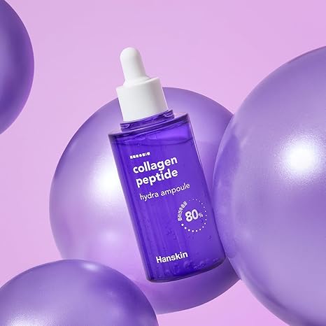 HANSKIN Collagen Peptide Hydra Ampoule 90ml with purple packaging and dropper set against a pastel purple background