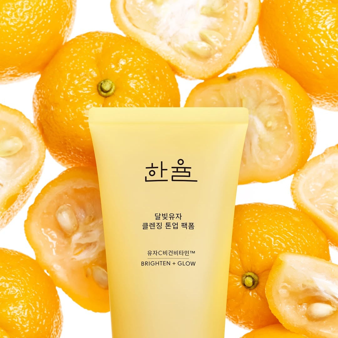 HANYUL Moonlight Yuja Vitamin Tone-Up Pack Foam 120ml with fresh citrus in background