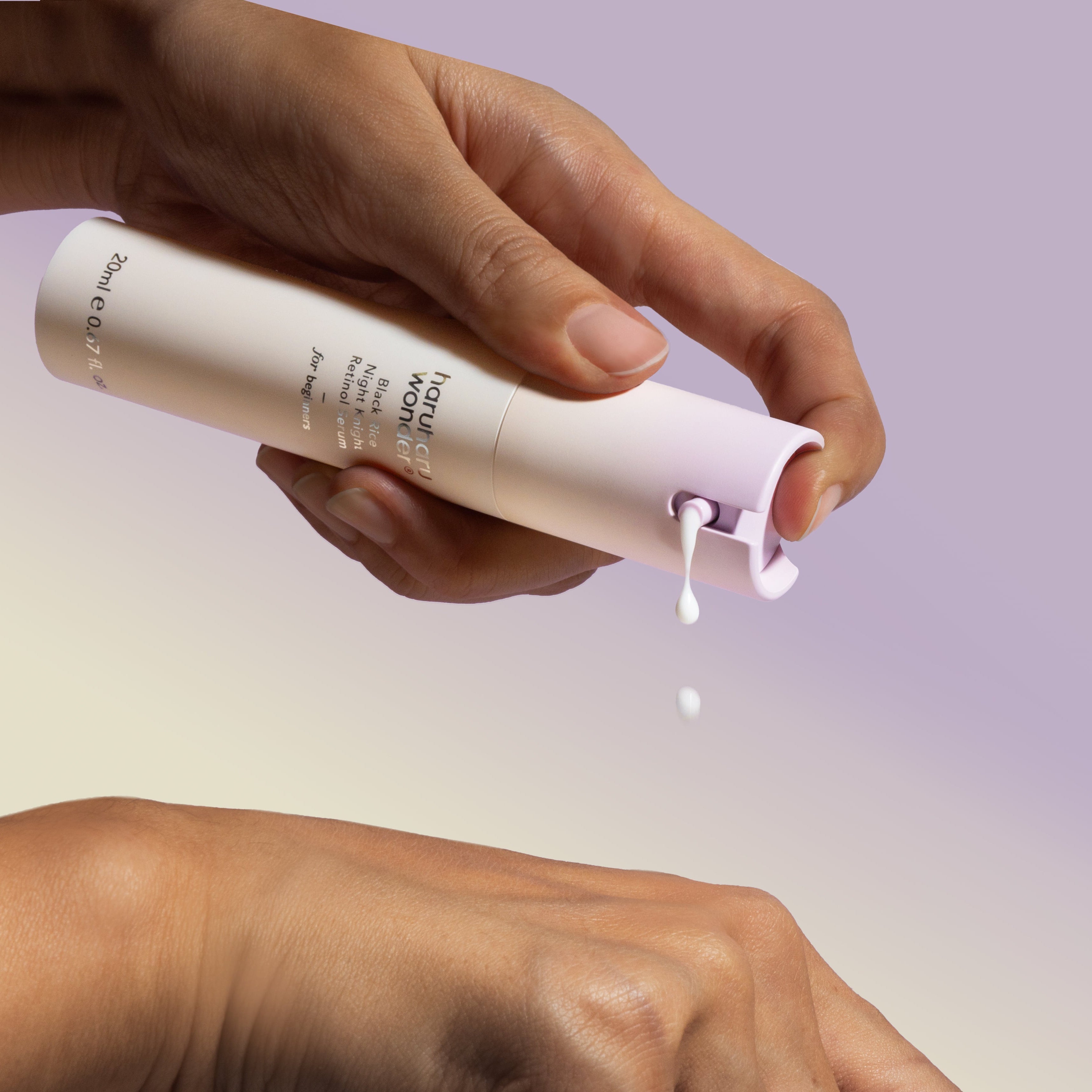 Applying HARUHARU Black Rice Night Night Retinol Serum 20ml on skin