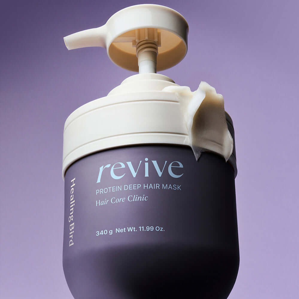 HEALING BIRD Revive Protein Deep Hair Mask 340g container with pump on purple background