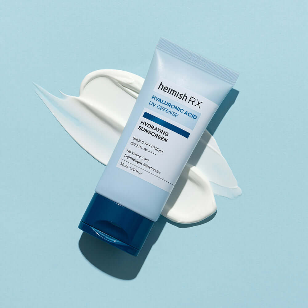 HEIMISH RX Hyaluronic Acid Hydrating Sunscreen SPF50+ PA++++ tube on light blue background
