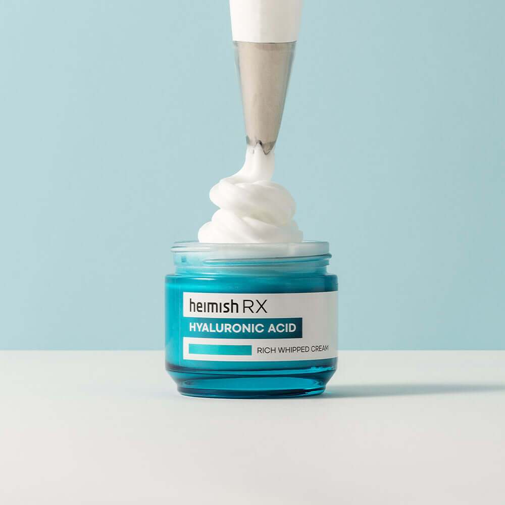 HEIMISH RX Hyaluronic Acid Rich Whipped Cream 50ml in jar with whipped texture against blue background