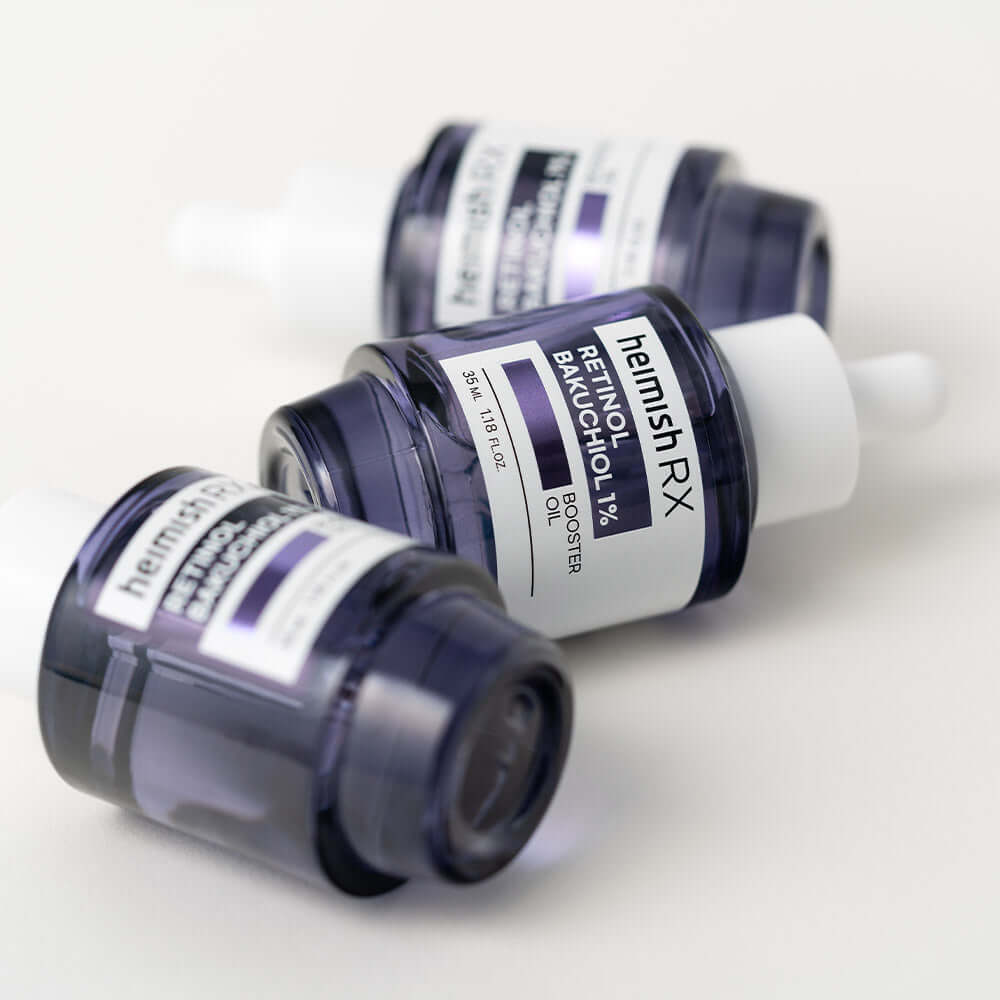 HEIMISH RX Retinol Bakuchiol Booster Oil 35ml bottles lying on a white surface