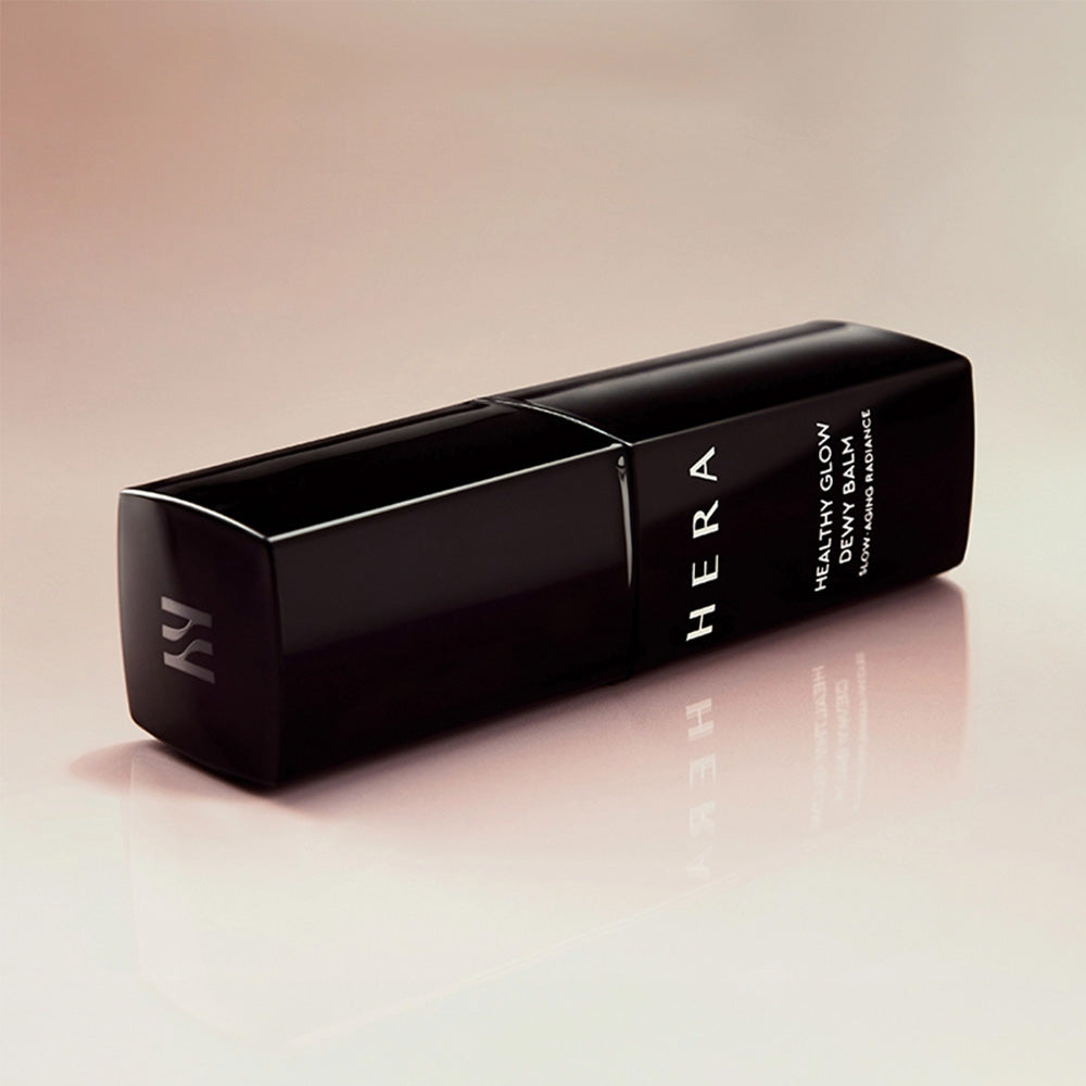 HERA Healthy Glow Dewy Balm 10g providing a radiant finish to enhance skin's natural luminosity. Ideal for a dewy and fresh appearance.