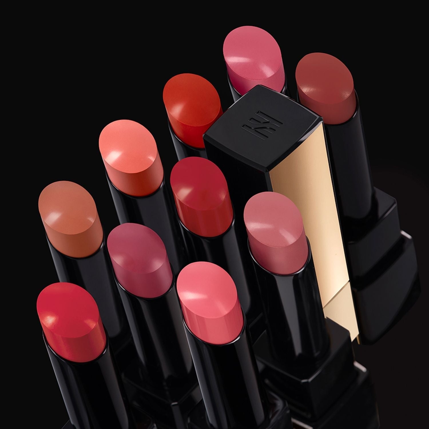 HERA Rouge Clasyy 3.5g lipsticks in various shades displayed on a sleek black background.