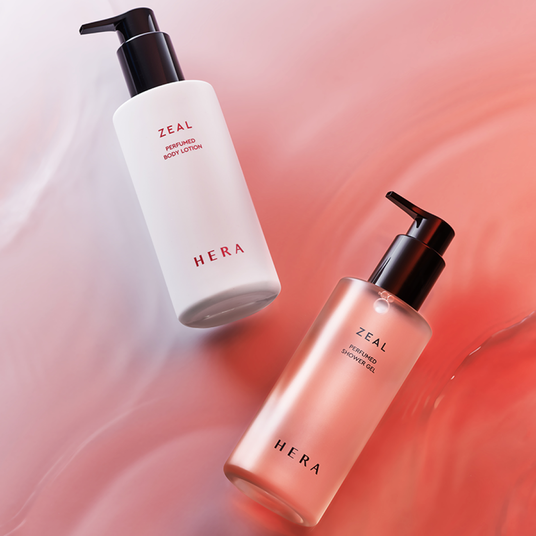 HERA Zeal Blooming Perfumed Body Lotion 230ml and Shower Gel on pink background
