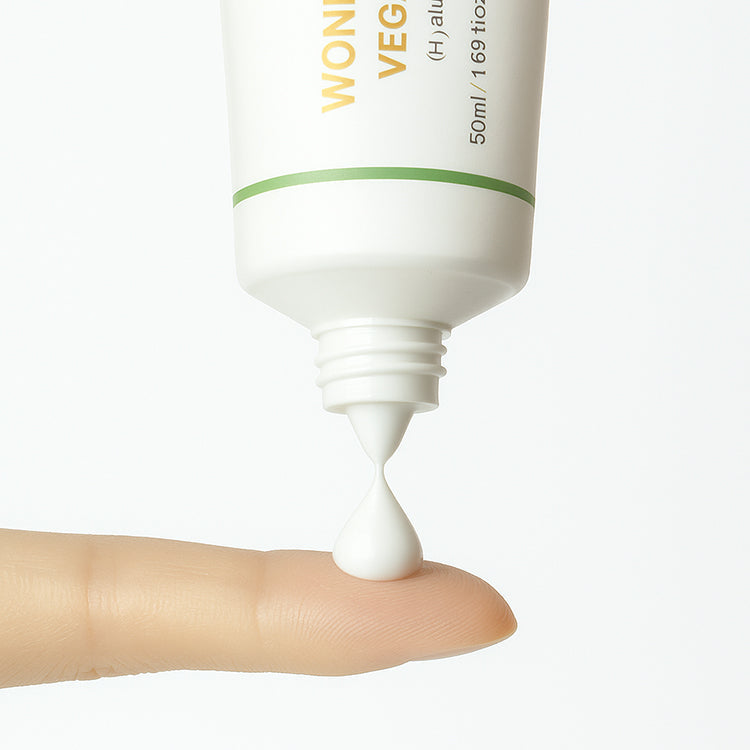 HERBLOOM Wonder Glow Kombucha Vegan Tone Up Cream 50ml dispensed on fingertip