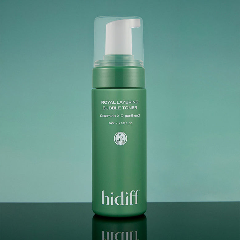 Bottle of HIDIFF Royal Layering Bubble Toner on green background, showcasing skincare product packaging.