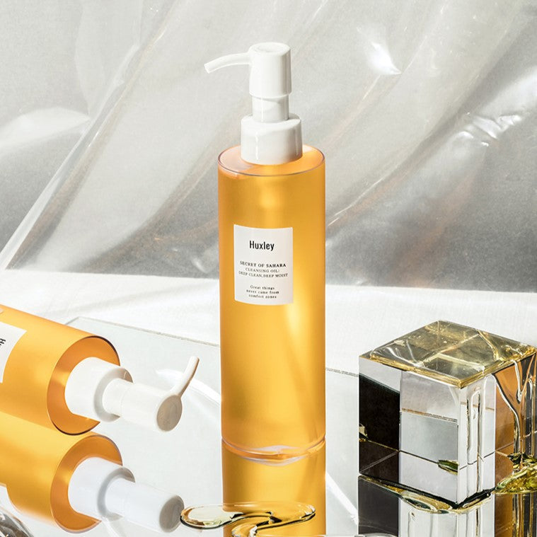 HUXLEY Cleansing Oil Deep Clean, Deep Moist 200ml bottle displayed elegantly on a reflective surface.