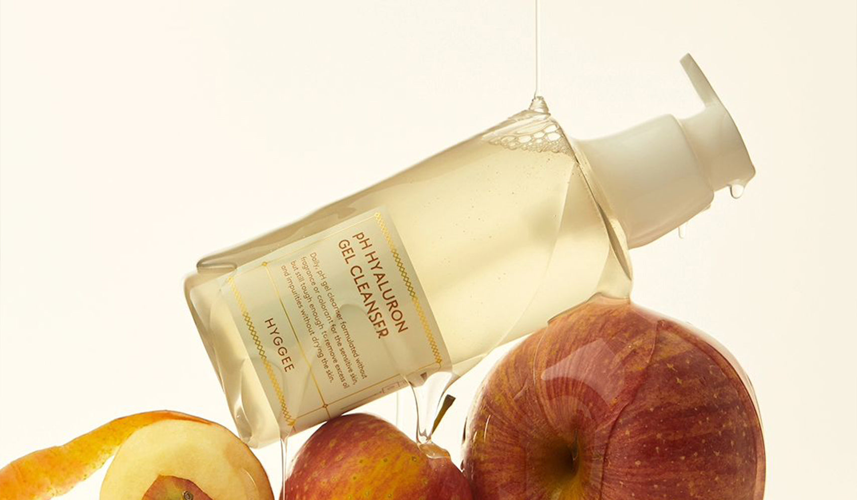 PH Hyaluronic Gel Cleanser with apples and peels, highlighting natural skincare ingredients and moisturizing benefits.