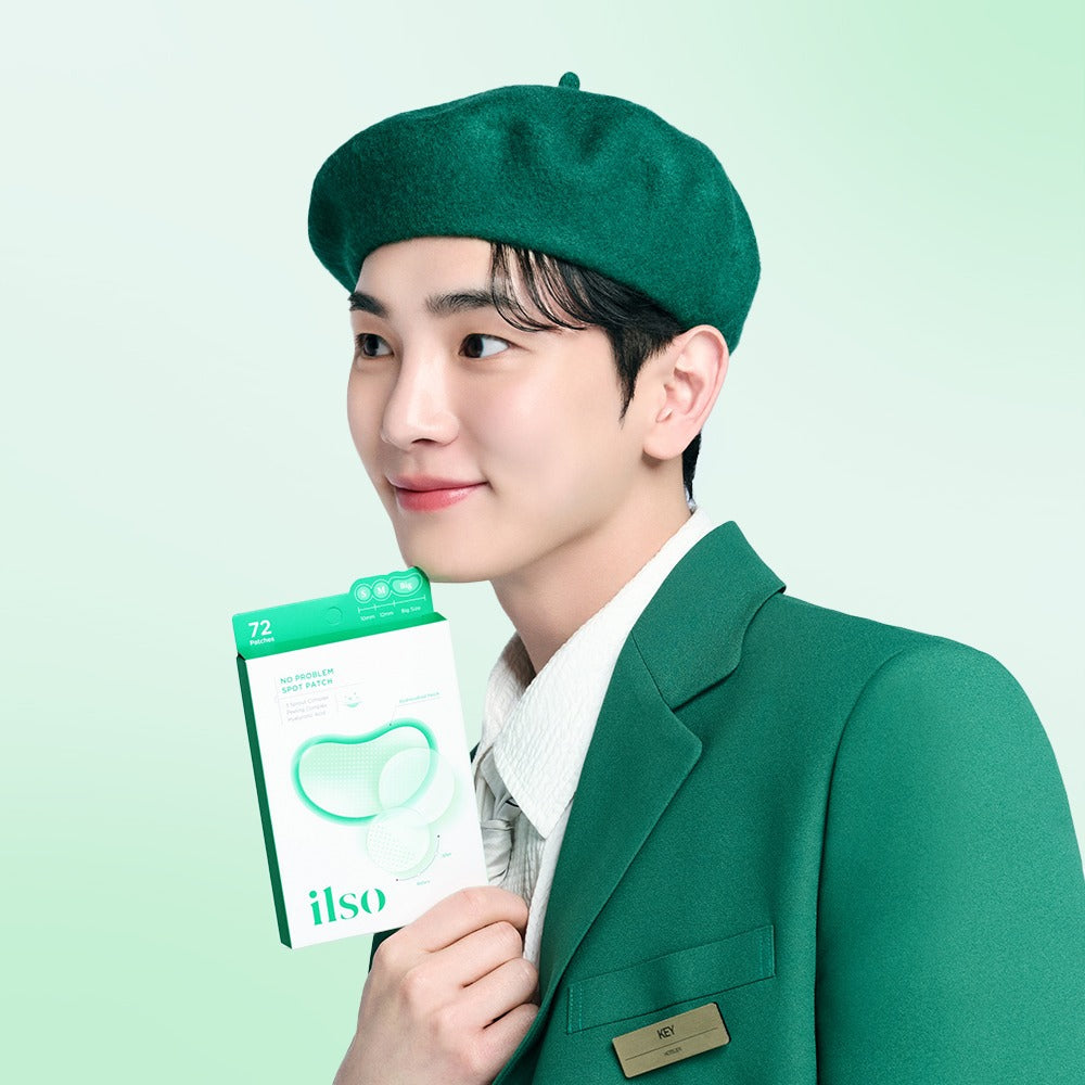 Person holding ILSO No Trouble Spot Patch product in a green package, highlighting skincare solution.