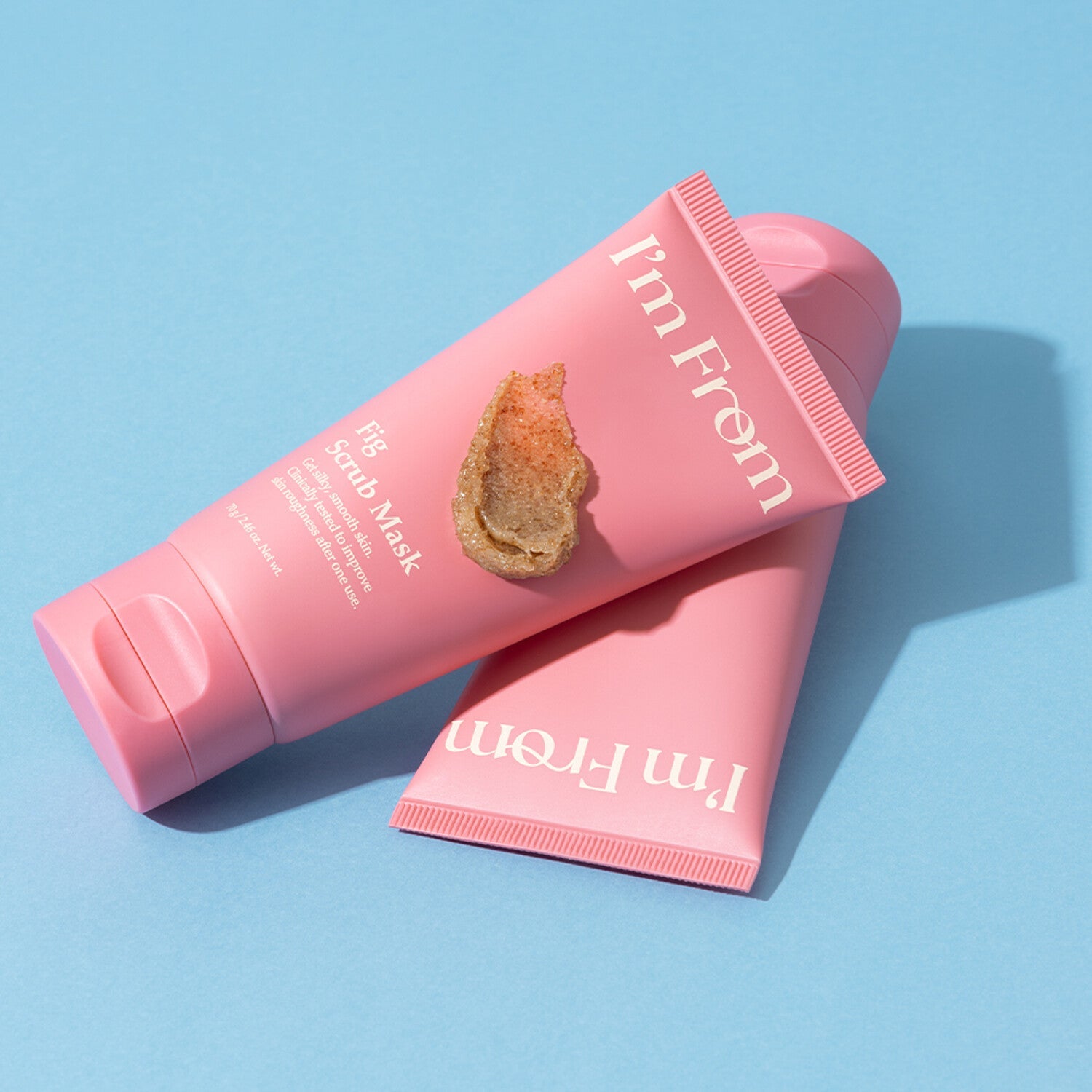 I'M FROM Fig Scrub Mask in pink tubes on a blue background