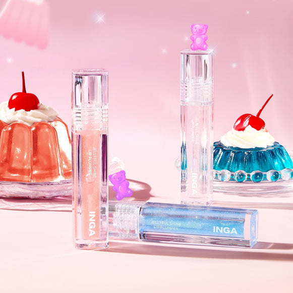 Colorful INGA Jellyful Shine Lip Plumper tubes with dessert-inspired background