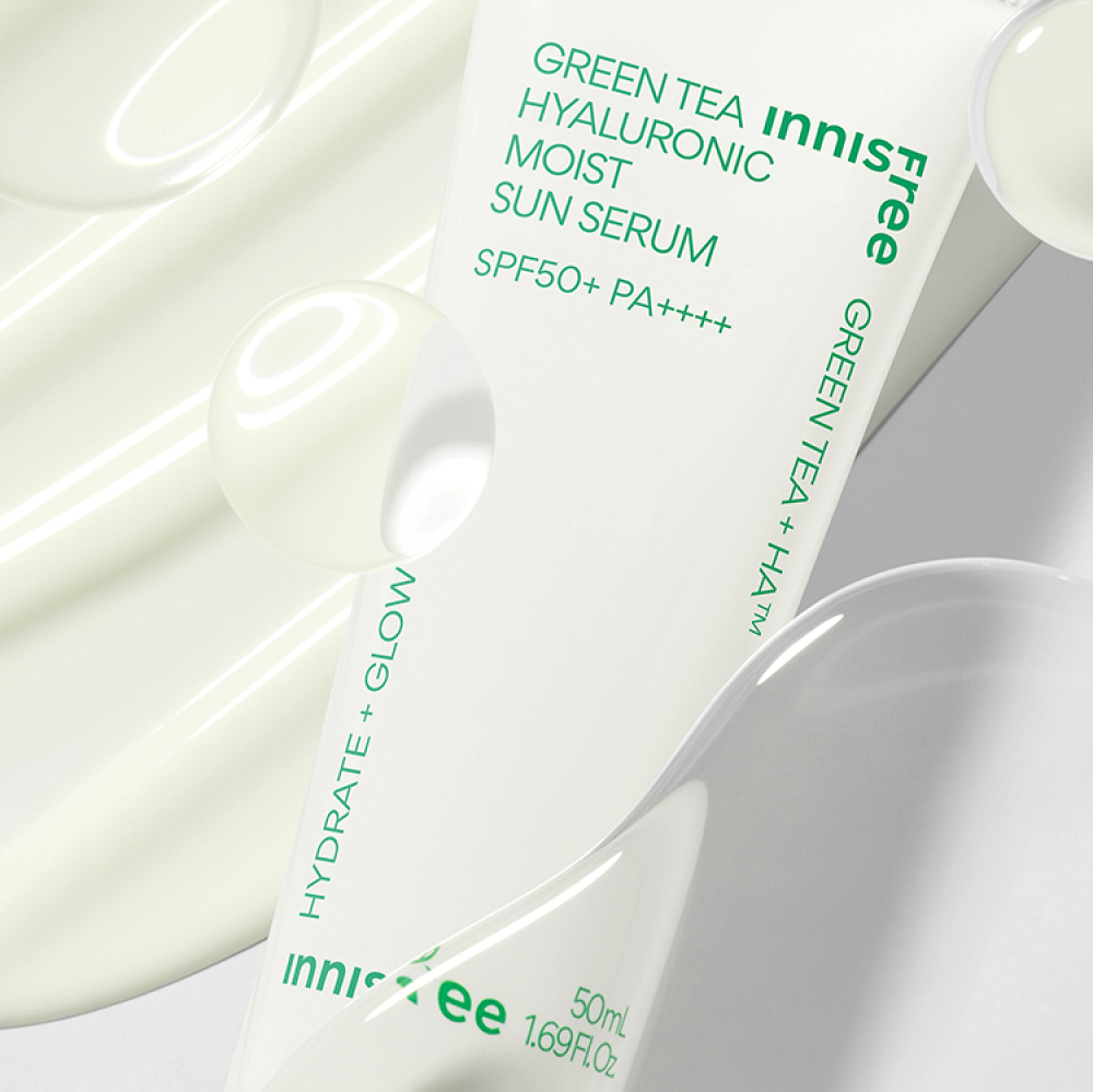 INNISFREE Green Tea Hyaluronic Moist Sun Serum SPF50 PA++++ 50ml tube with hydrating formula swirls and product text on packaging.