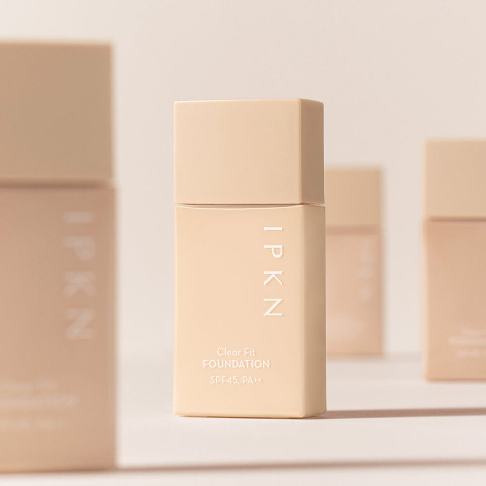 IPKN Clear Fit Foundation SPF45, PA++ 40ml bottle in a minimalist beige design.