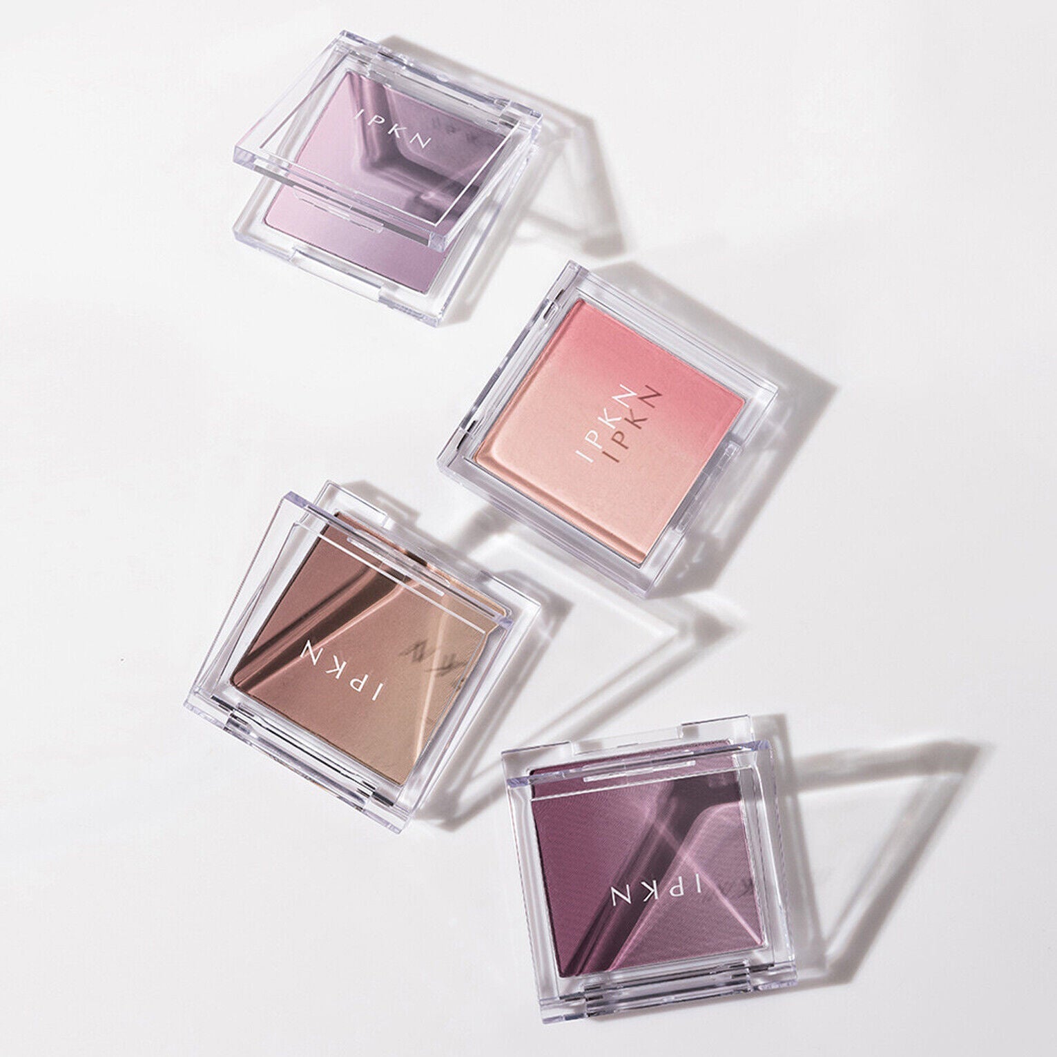 IPKN Personal Mood Layering Blusher 9.5g in four shades, showcasing elegant packaging and vibrant colors.