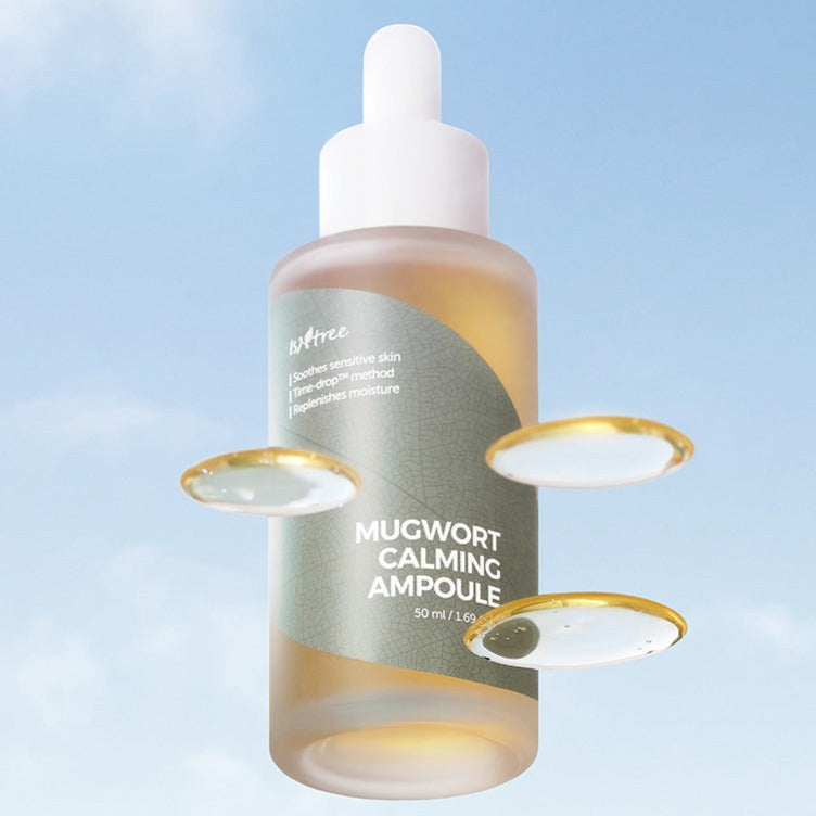 ISNTREE Mugwort Calming Ampoule 50ml bottle floating with drops against a blue sky background