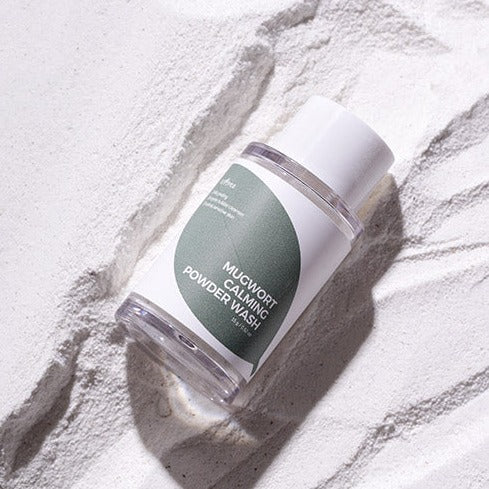 ISNTREE Mugwort Calming Powder Wash 15g on textured white background