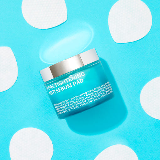 ISOI Pore Tightening Anti-Sebum Pads 60 Sheets on blue background with opened jar