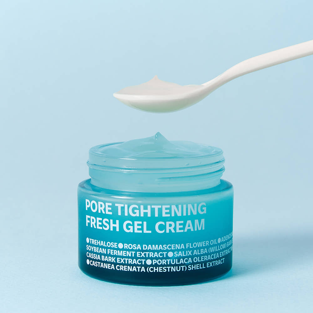 ISOI Pore Tightening Fresh Gel Cream 50ml with a spoon above, highlighting the gel texture against a blue background.