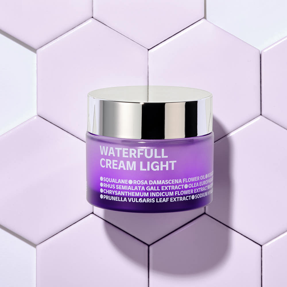 ISOI Waterful Cream Light 50ml jar on a geometric tile background